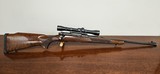 Winchester Model 70 Featherweight .243 Win W/ Weaver Optic