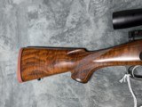 MONTANA RIFLE CO M1999 DANGEROUS GAME RIFLE IN .458 LOTT, WITH 24" BARREL AND LEUPOLD EUROPEAN 30 1.25"-4 SCOPE IN LIKE NEW CONDITION - 16 of 20