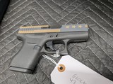 GLOCK 43 WITH BURNT BRONZE AMERICAN FLAG CERACOATED SLIDE, IN 9MM, IN EXCELLENT CONDITION - 10 of 13