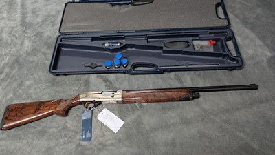 LIKE NEW UNFIRED 2004 BERETTA AL 391 TEKNYS SPORTING 12GA WITH 26" BARREL.