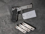 SMITH & WESSON PERFOMANCE CENTER PPC MODEL 9MM
WITH 5