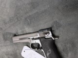 SMITH & WESSON PERFOMANCE CENTER PPC MODEL 9MM
WITH 5