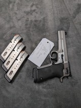 SMITH & WESSON PERFOMANCE CENTER PPC MODEL 9MM
WITH 5