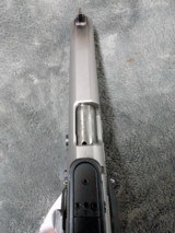 SMITH & WESSON PERFOMANCE CENTER PPC MODEL 9MM
WITH 5