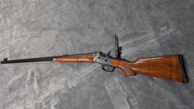 PEDERSOLI / CIMARRON ROLLING BLOCK CHAMBERED IN .45-70 WITH 30" OCTAGON BARREL, AND LONG RANGE SIGHTS IN EXCELLENT CONDITION