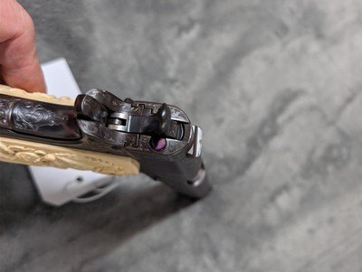 MIKE SAWMILLER ENGRAVED 1916 COLT 1911 WITH CARVED IVORY GRIPS, IN LIKE EXCELLENT/ AS ENGRAVED CONDITION - Image 19 of 20