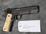 MIKE SAWMILLER ENGRAVED 1916 COLT 1911 WITH CARVED IVORY GRIPS, IN LIKE EXCELLENT/ AS ENGRAVED CONDITION