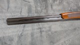 MIDLAND GUN COMPANY O/U 12GA IN FAIR CONDITION 27.5
