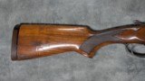 MIDLAND GUN COMPANY O/U 12GA IN FAIR CONDITION 27.5