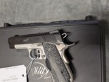 Kimber Master Carry Pro in .45 acp, with Crimson Trace Grips, 4