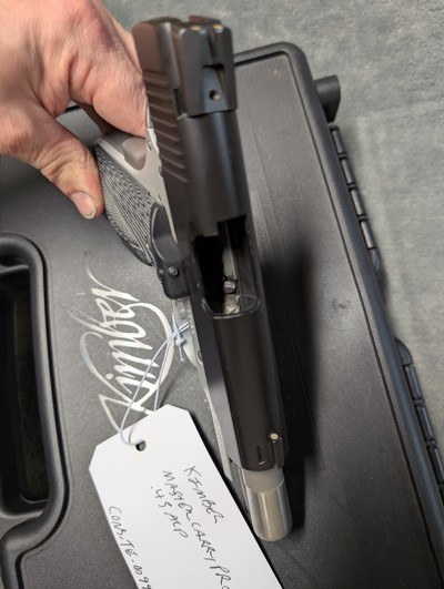 Kimber Master Carry Pro in .45 acp, with Crimson Trace Grips, 4