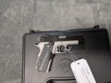 Kimber Master Carry Pro in .45 acp, with Crimson Trace Grips, 4
