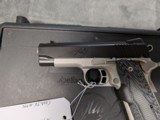 Kimber Master Carry Pro in .45 acp, with Crimson Trace Grips, 4