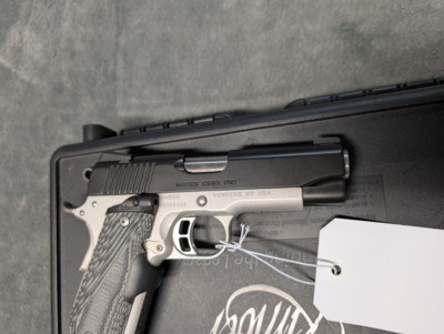 Kimber Master Carry Pro in .45 acp, with Crimson Trace Grips, 4