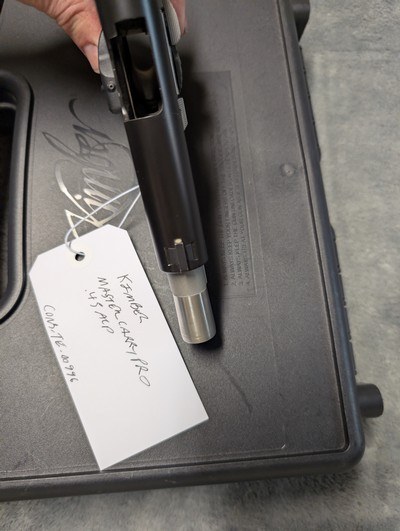 Kimber Master Carry Pro in .45 acp, with Crimson Trace Grips, 4