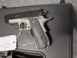 Kimber Master Carry Pro in .45 acp, with Crimson Trace Grips, 4