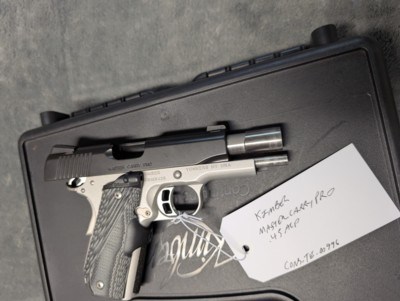 Kimber Master Carry Pro in .45 acp, with Crimson Trace Grips, 4