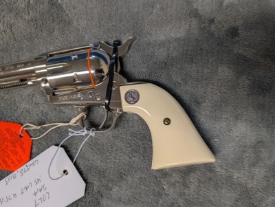 NICKEL COLT SINGLE ACTION ARMY IN .45 COLT WITH 4.75: BARREL IN EXCELLENT CONDITION, HAS POLYMER IVEX GRIPS - Image 7 of 20