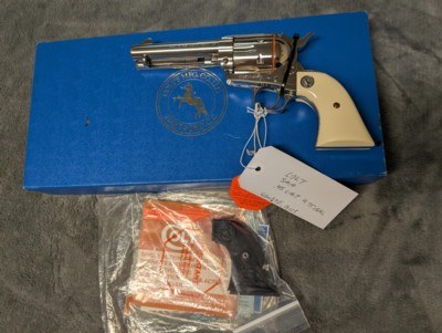 NICKEL COLT SINGLE ACTION ARMY IN .45 COLT WITH 4.75: BARREL IN EXCELLENT CONDITION, HAS POLYMER IVEX GRIPS - Image 1 of 20