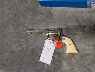 NICKEL COLT SINGLE ACTION ARMY IN .45 COLT WITH 4.75: BARREL IN EXCELLENT CONDITION, HAS POLYMER IVEX GRIPS - Image 19 of 20