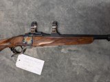 DAKOTA ARMS MODEL 10 IN .223 REM IN EXCELLENT CONDITION, WITH COLOR CASE HARDENED RECEIVER AND RINGS, 2