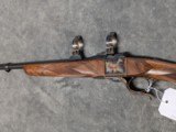 DAKOTA ARMS MODEL 10 IN .223 REM IN EXCELLENT CONDITION, WITH COLOR CASE HARDENED RECEIVER AND RINGS, 2