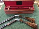 Pair of David McKay Brown Round body Over & Under 12 bore shotgun - 1 of 5