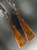 A pair of Holland & Holland Royal 12 bore side by side shotguns - 1 of 7