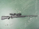 WINCHESTER MODEL 70 IN 270-WSM CALIBER BOLT ACTION REPEATER WITH SIMMONS ATV 4.5-14X40 DUPLEX AO - 1 of 21