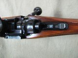 1988 RUGER M77 7MM REMINGTON MAGNUM CALIBER BOLT ACTION REPEATER WITH ORIGINAL RED BUTT PAD - 16 of 21