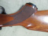 1988 RUGER M77 7MM REMINGTON MAGNUM CALIBER BOLT ACTION REPEATER WITH ORIGINAL RED BUTT PAD - 6 of 21