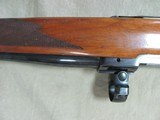 1988 RUGER M77 7MM REMINGTON MAGNUM CALIBER BOLT ACTION REPEATER WITH ORIGINAL RED BUTT PAD - 4 of 21