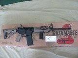 NEW BUSHMASTER
5.56MM 16M4 MOED WITH ADDED PL-PRO VALKYRIE LIGHT AND FOREND PISTOL GRIP - 1 of 11