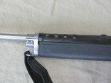 RUGER MINI14 STAINLESS 223 CALIBER SEMI AUTO CARBINE WITH A GOOD STEEL BUTLER CREEK SIDE FOLDING STOCK MANUFACTURED IN 1982 - 11 of 17