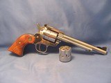 BRIGHT STAINLESS RUGER SINGLE SIX SINGLE ACTION 22LR / 22 MAGNUM SIX SHOT CONVERTIBLE REVOLVER - 1 of 17