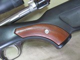 SKELETON STOCKED WITH WOOD INSERTS RUGER M77 22-250 BOLT ACTION RIFLE WITH LEUPOLD 3-9X40 - 12 of 21