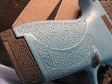 NEW CUSTOM S&W SHIELD PLUS TURQUOISE 9MM SEMI AUTO PISTOL
13248 - 4 of 8