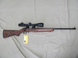 RUGER AMERICAN FARMHOUSE RIMFIRE 17HMR FACTORY ETCHED WOOD STOCKED BOLT ACTION RIFLE WITH CP 4-16X40 SCOPE