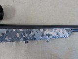 SAVAGE MODEL 10 TACTICAL BOLT ACTION DIGITAL CAMO 223 RIFLE WITH BUSHNELL 3-9X40 DUPLEX AND LOOKS UNFIRED - 3 of 17