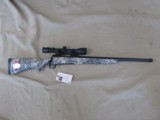 SAVAGE MODEL 10 TACTICAL BOLT ACTION DIGITAL CAMO 223 RIFLE WITH BUSHNELL 3-9X40 DUPLEX AND LOOKS UNFIRED