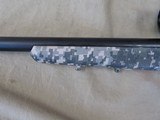 SAVAGE MODEL 10 TACTICAL BOLT ACTION DIGITAL CAMO 223 RIFLE WITH BUSHNELL 3-9X40 DUPLEX AND LOOKS UNFIRED - 11 of 17
