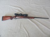 WINCHESTER XTR SPORTER MODEL 70 RIFLE IN 300 WEATHERBY MAGNUM WITH REDFIELD SCOPE - 1 of 22