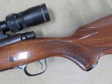 WINCHESTER MODEL 70 RIFLE IN 300 MAGNUM WITH VORTEX 3-9X40 SCOPE - 9 of 19