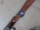 WINCHESTER MODEL 70 RIFLE IN 300 MAGNUM WITH VORTEX 3-9X40 SCOPE - 14 of 19