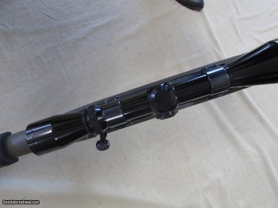 REMINGTON 700 7MM MAGNUM BOLT ACTION RIFLE & LEUPOLD VARIX II 3-9X40 SCOPE & EXTRAS - Image 13 of 13