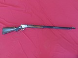 THIS IS A MARLIN MODEL 97 TAKEDOWN 22LR CALIBER LEVER ACTION RIFLE MFG 1906