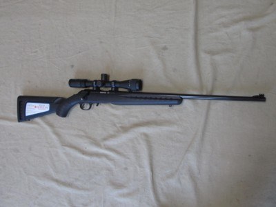 VERY NICE RUGER 22 MAGNUM BOLT ACTION RIFLE WITH A VERY WELL PLACED SIMMONS 3 9X32WAAO 22 MAG SCOPE