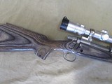 REMINGTON 700 STAINLESS LAMINATED 7MM REM ULTRA MAGNUM BOLT ACTION RIFLE & BAUSCH & LOMB ELITE 4200 SCOPE RUM - 4 of 13