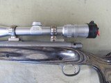 REMINGTON 700 STAINLESS LAMINATED 7MM REM ULTRA MAGNUM BOLT ACTION RIFLE & BAUSCH & LOMB ELITE 4200 SCOPE RUM - 8 of 13