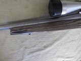 REMINGTON 700 STAINLESS LAMINATED 7MM REM ULTRA MAGNUM BOLT ACTION RIFLE & BAUSCH & LOMB ELITE 4200 SCOPE RUM - 9 of 13